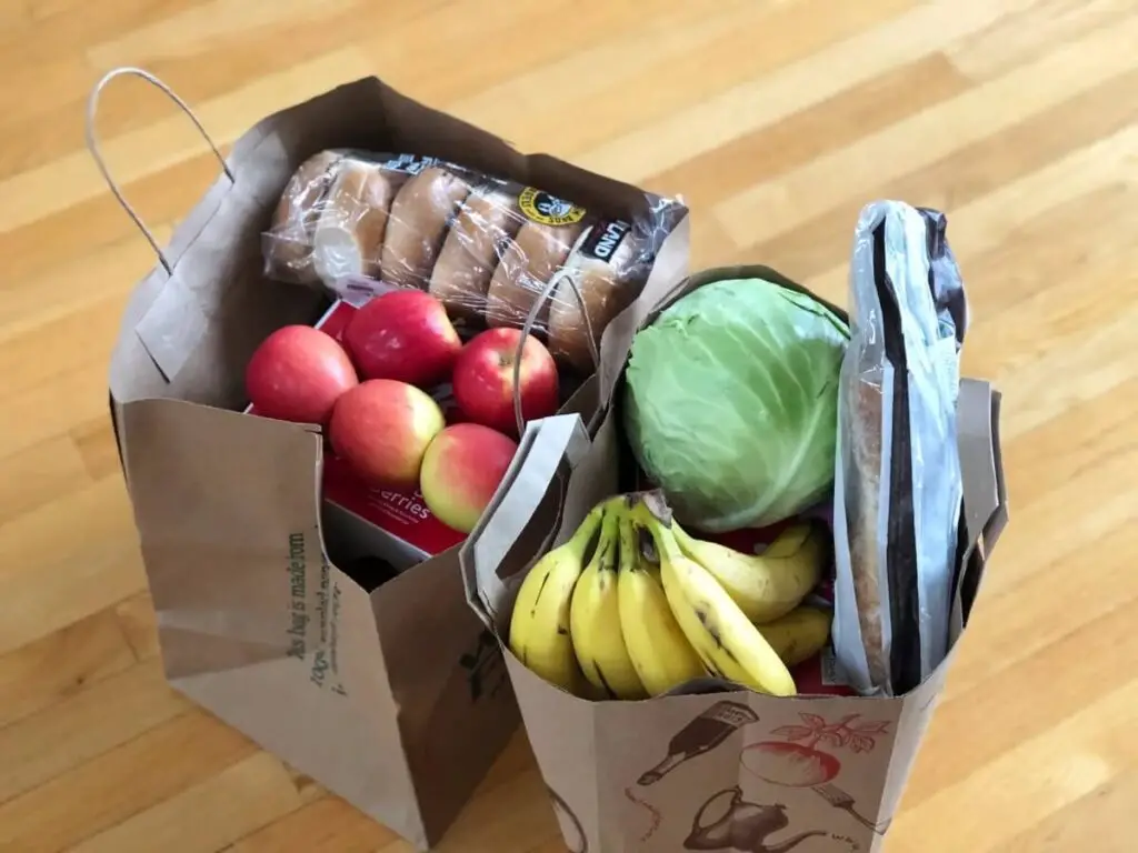 a bunch of food bagged for delivery to a client in need in the community