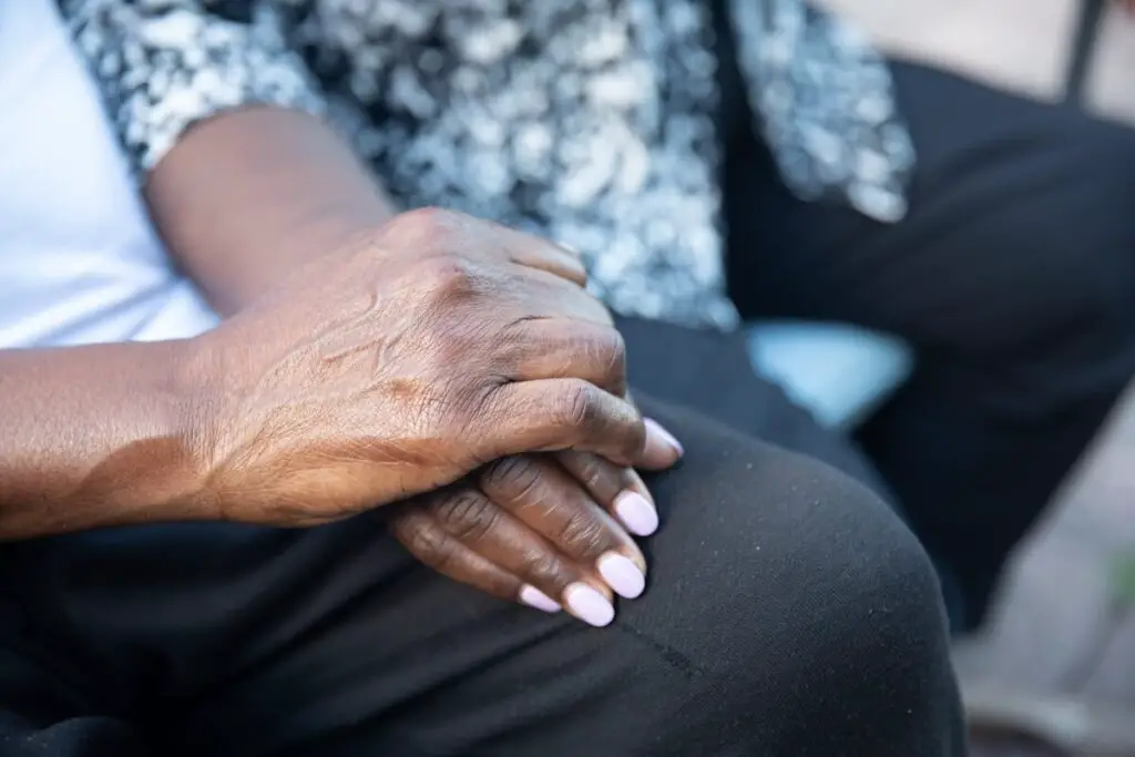 two people offering eachother support while holding hands