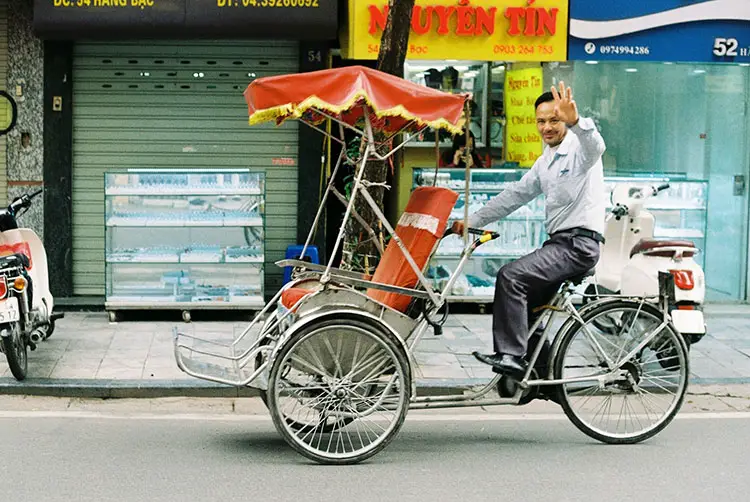 man on tricycle in Hanoi