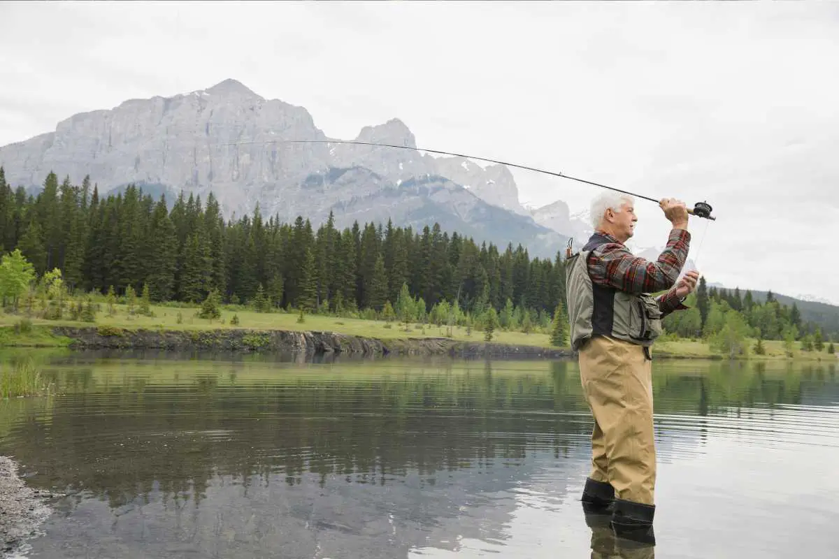 photo of something elderly men seem to really enjoy - fly fishing while hearing nature sounds