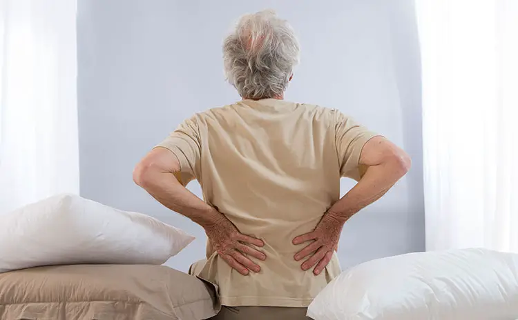 old man with back pain