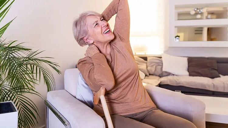 elderly woman suffering from fibromyalgia