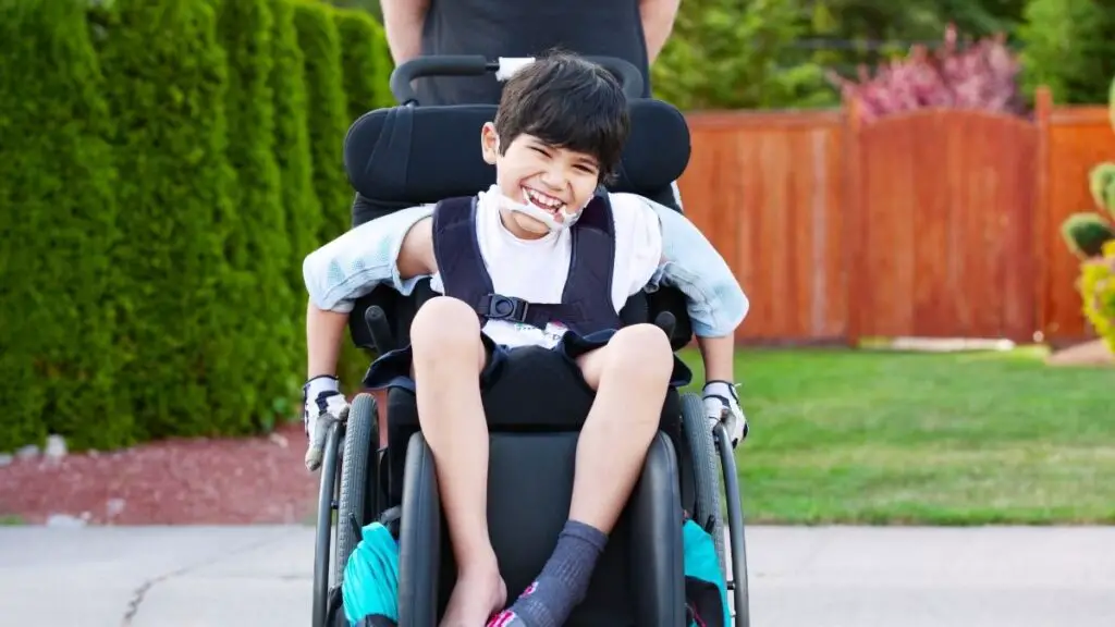 disabled boy with wheelchair seat belts