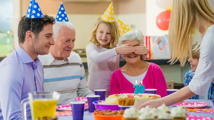 family celebrating grandmother birthday