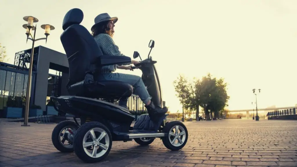 woman riding off-road mobility scooter