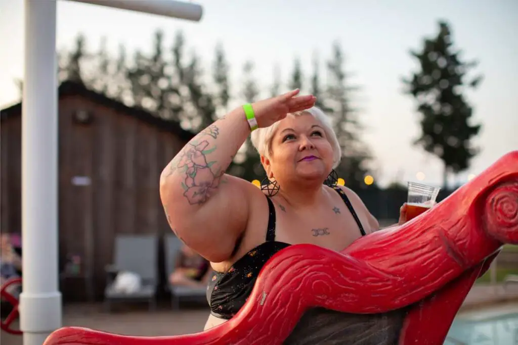 An older woman in a bikini outdoors