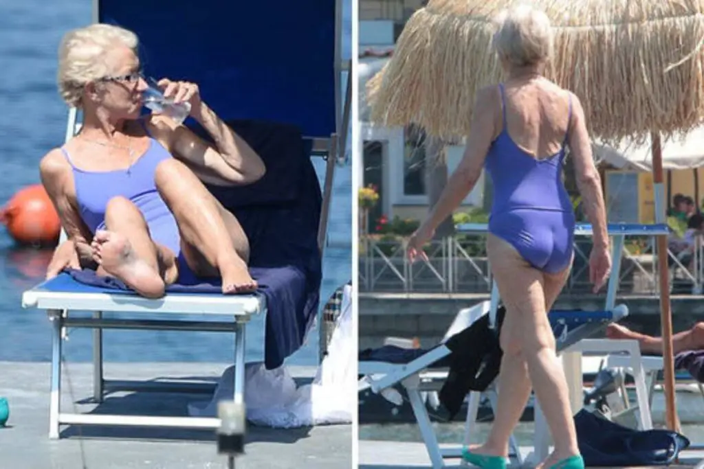 Helen Mirren, a mature woman on vacation in a swimsuit at the beach