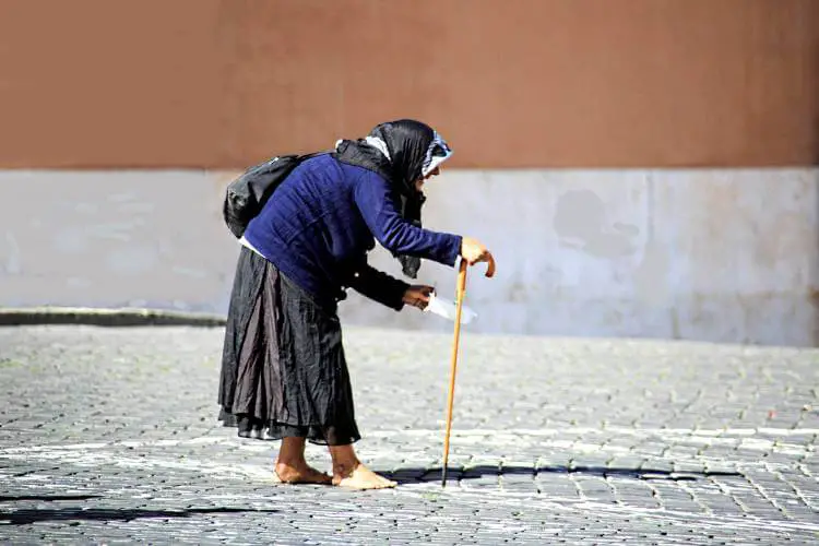elderly woman with a cane