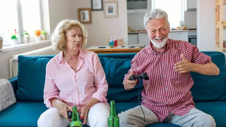 senior couple playing video games