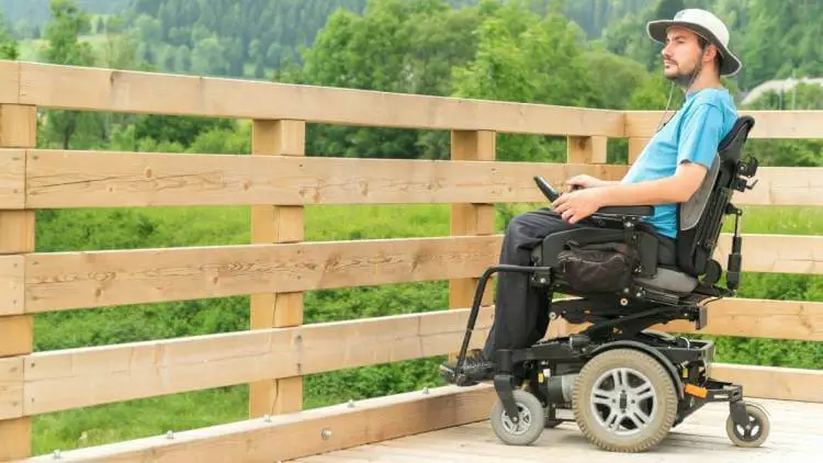 disabled man in mid-wheel drive chair