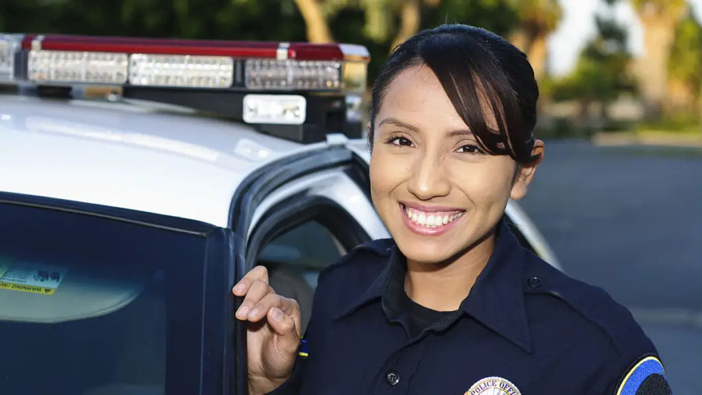 police officer conducting welfare check on seniors