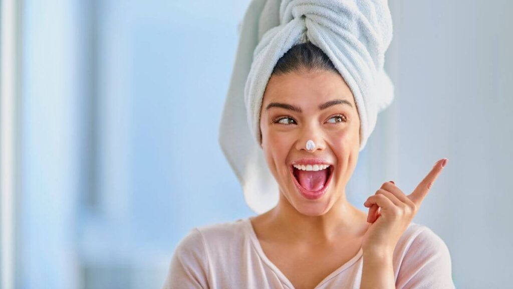 woman applying Cetaphil