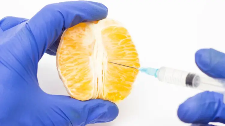 doctor injects orange