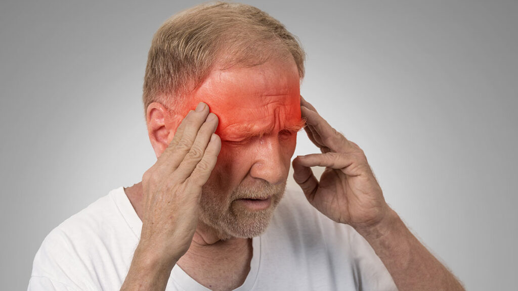 man with migraine headache