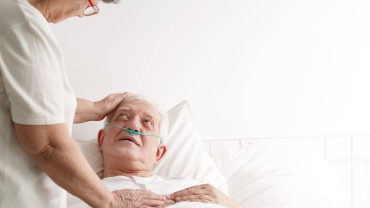 sick senior man in hospice