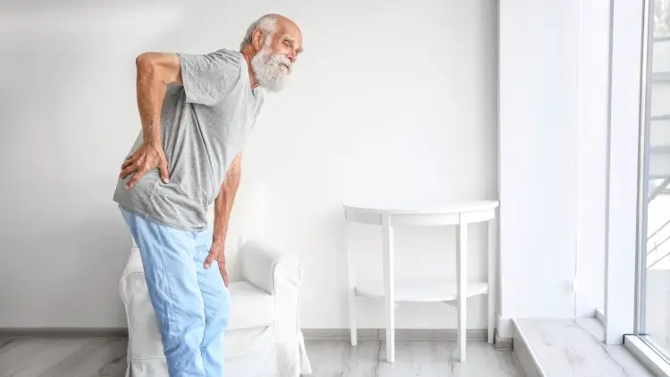 senior man with chronic back pain