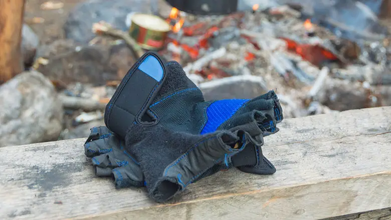 fingerless gloves near campfire