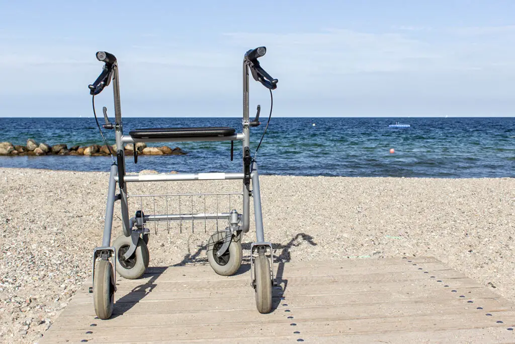 image of a beach walker on boardwalk