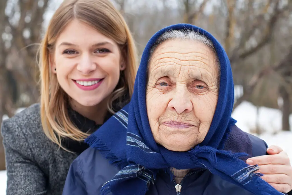 image of an elderly woman with her caretaker