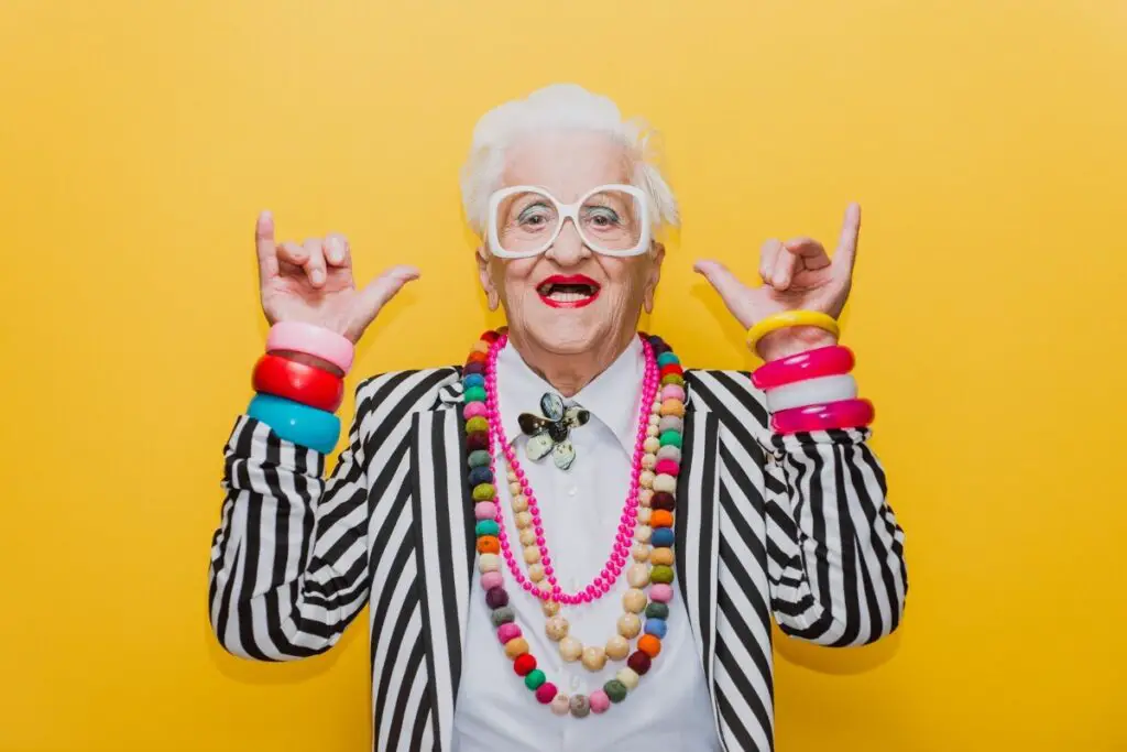an example of a fun mom and grandmother that loves to spend time making others smile with her colorful outfits and accessories