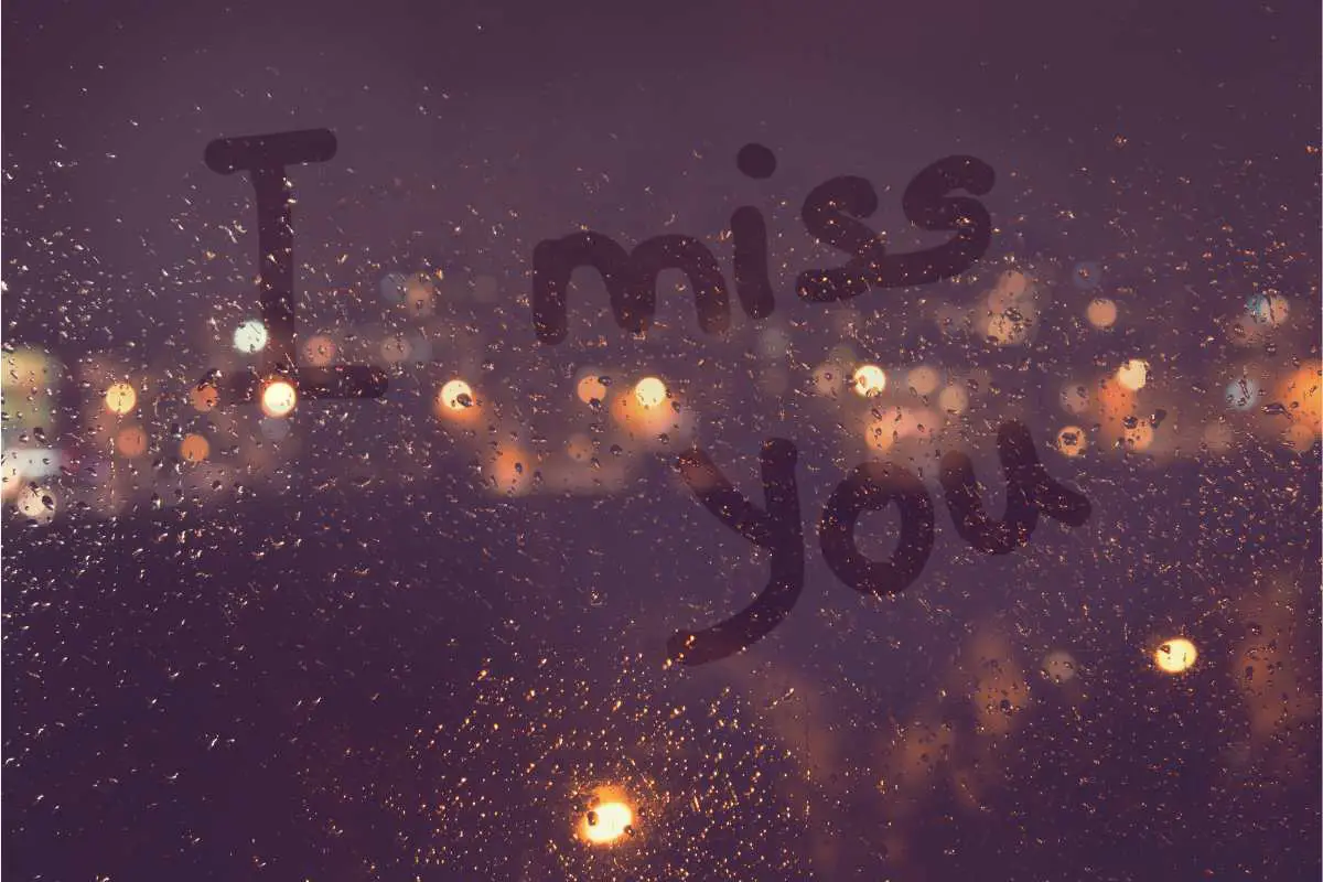 i miss you, written on a cloudy window - farewell words for someone deeply missed that will remain in hearts forever
