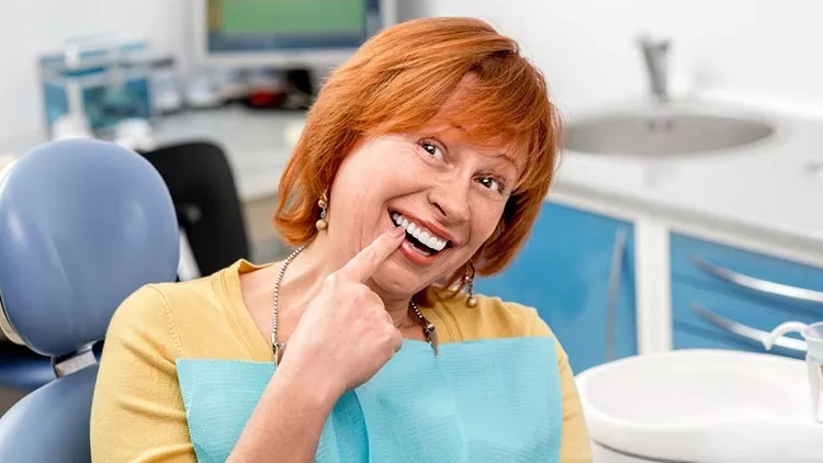 senior woman in dental clinic